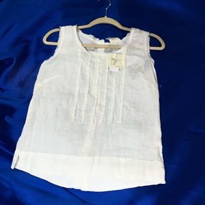 A Sleeveless White Shirt. With Tags